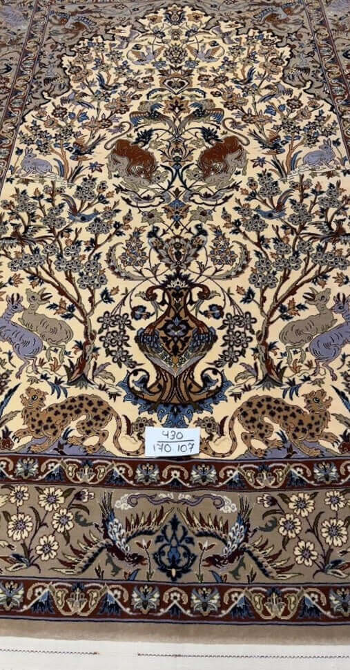 "Luxurious small Persian rug with pile knots and detailed floral motifs"